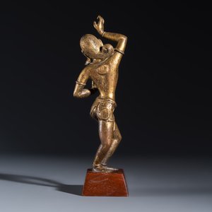 A Nepalese gilt-copper alloy figure of a dancing goddess — photo 4