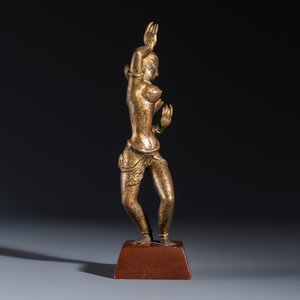 A Nepalese gilt-copper alloy figure of a dancing goddess — photo 5