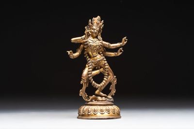 A Nepalese or Tibetan turquoise-inlaid gilt-bronze sculpture of Kurukulla or Red Tara, 15th C. or later