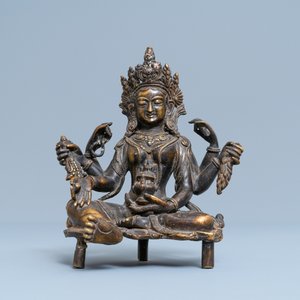 A Nepalese solid bronze figure of Vasudhara, 19th C. — 照片 2