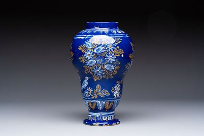 A Nevers blue-ground baluster vase with birds among flowering branches, France, 2nd half 17th C.