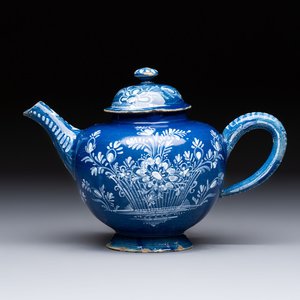 A Nevers white-decorated blue-ground faience teapot and cover, France, 18th C. — photo 1