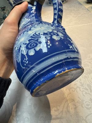 A Nevers white-decorated Persian-blue-ground faience jug with a mounted pewter lid, France, 18th C. — photo 12