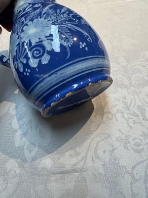 A Nevers white-decorated Persian-blue-ground faience jug with a mounted pewter lid, France, 18th C. — photo 13