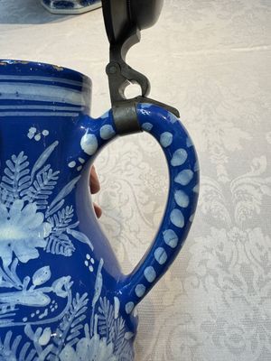 A Nevers white-decorated Persian-blue-ground faience jug with a mounted pewter lid, France, 18th C. — photo 8