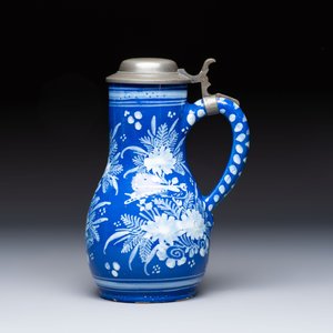A Nevers white-decorated Persian-blue-ground faience jug with a mounted pewter lid, France, 18th C. — photo 2