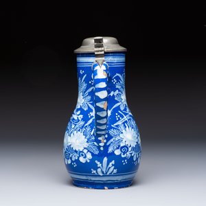 A Nevers white-decorated Persian-blue-ground faience jug with a mounted pewter lid, France, 18th C. — photo 3