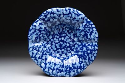 A Nevers white-splashed blue-ground 'à la bougie' dish, France, late 17th C.