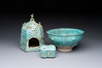 A Nishapur turquoise-glazed bowl, an inkwell and an incense burner or lantern, Iran, 10/12th C.