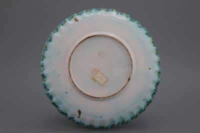 A notched Brussels faience butterfly plate, 18th C.