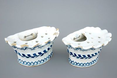 A pair of blue and white bouquetieres or wall flower holders, Lille, 18th C.