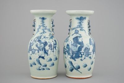 A pair of blue and white Chinese vases on celadon ground with playing boys 19th C.