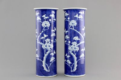 A pair of blue and white Chinese vases with prunus decoration, 19th C.