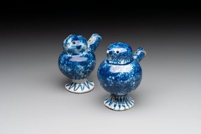 A pair of blue and white Dutch Delft 'bird' whistles, 18th C.