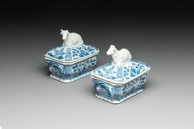 A pair of blue and white Dutch Delft cow-topped butter tubs and covers, 18th C.