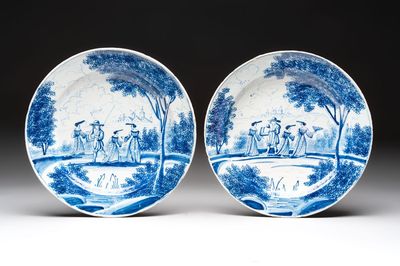 A pair of blue and white Dutch Delft dishes with a pastoral scene, 18th C.