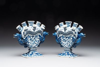 A pair of blue and white Dutch Delft heart-shaped tulip vases, early 18th C.