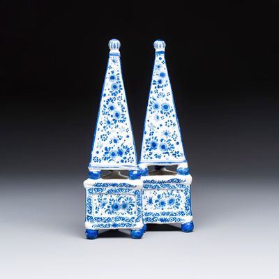 A pair of blue and white Dutch Delft obelisks with floral design, 18th C.