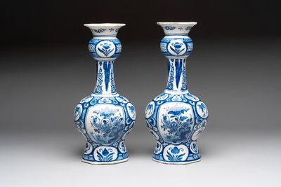 A pair of blue and white Dutch Delft vases with floral design, 18th C.