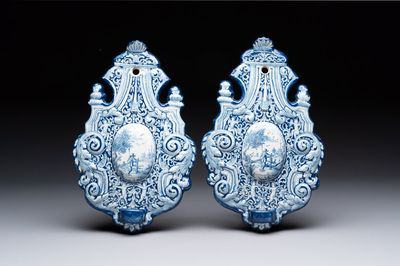 A pair of blue and white Dutch Delft wall sconces, 18th C.