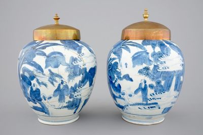 A pair of blue and white Japanese porcelain vases with brass covers in Chinese transitional style, Edo, 17th C.