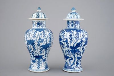 A pair of blue and white vases and covers, Kangxi, ca. 1700