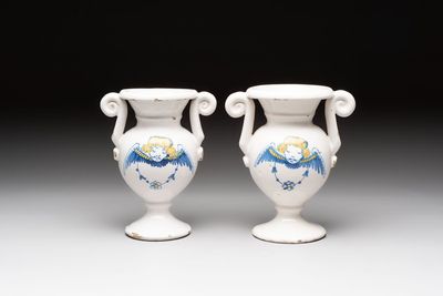 A pair of blue, white and yellow Dutch Delft altar vases, late 17th C.