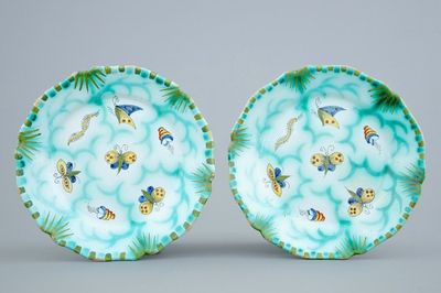 A pair of Brussels faience plates with butterflies and caterpillars, 18/19th C.