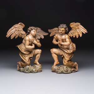 A pair of carved and gilt-polychromed wooden winged angels — photo 1