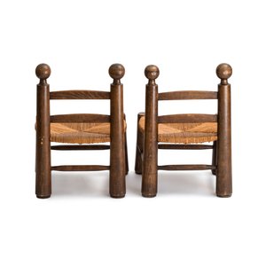 A pair of chairs in oak and straw, attributed to Charles Dudouyt — foto 4