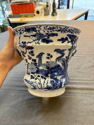 A pair of Chinese blue and white 'birds among flowering branches' jardinières, 19th C. — photo 1