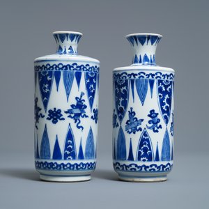 A pair of Chinese blue and white 'Buddhist emblems' rouleau vases, Kangxi — photo 2
