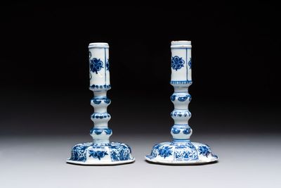 A pair of Chinese blue and white candlesticks with floral design, Kangxi