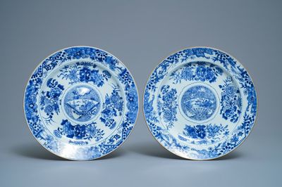A pair of Chinese blue and white dishes with raised central medallions, Kangxi