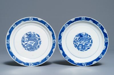 A pair of Chinese blue and white 'dragon' plates, Kangxi mark and of the period
