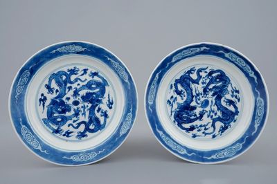 A pair of Chinese blue and white dragon plates, Xuande marks, Kangxi