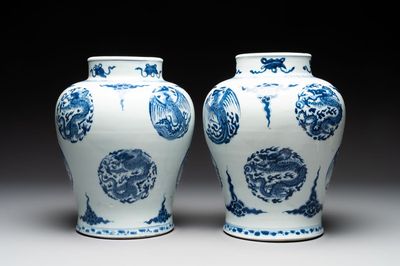 A pair of Chinese blue and white 'dragons and phoenixes' vases, Kangxi