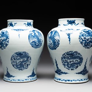 A pair of Chinese blue and white 'dragons and phoenixes' vases, Kangxi — photo 1