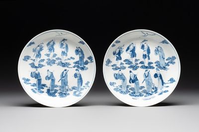 A pair of Chinese blue and white 'Eight Immortals' plates, Kangxi mark, 19th C.
