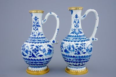 A pair of Chinese blue and white gilt-bronze mounted jugs, Transitional period, 1620-1683
