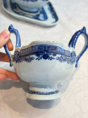 A pair of Chinese blue and white handled sauce boats and stands with pagodas along a river, Qianlong — photo 15