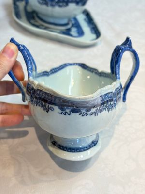 A pair of Chinese blue and white handled sauce boats and stands with pagodas along a river, Qianlong — photo 16
