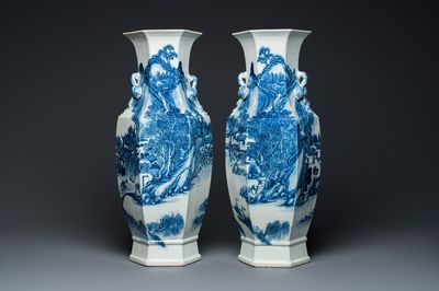 A pair of Chinese blue and white hexagonal 'mountainous landscape' vases, 19th C.