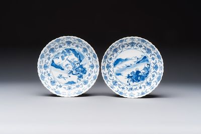 A pair of Chinese blue and white 'Hunting' plates, Chenghua marks, Kangxi