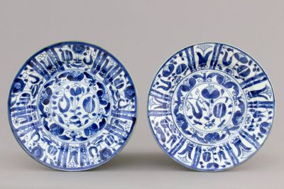 A pair of Chinese blue and white Kraak style pomegranate plates, Kangxi, ca. 1700