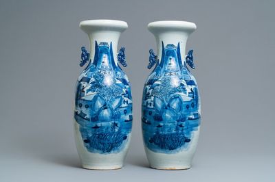 A pair of Chinese blue and white 'landscape' vases, 19th C.