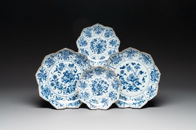 A pair of Chinese blue and white 'lotus' dishes and a pair of plates, Kangxi/Yongzheng
