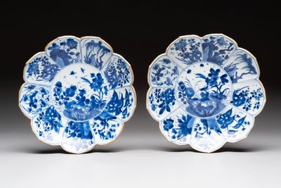 A pair of Chinese blue and white lotus-form 'Grasshopper' plates, Kangxi
