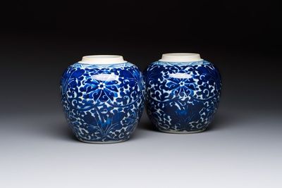 A pair of Chinese blue and white 'Lotus Scroll' jars, 19th C.