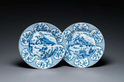 A pair of Chinese blue and white 'mountainous landscape' dishes, Kangxi